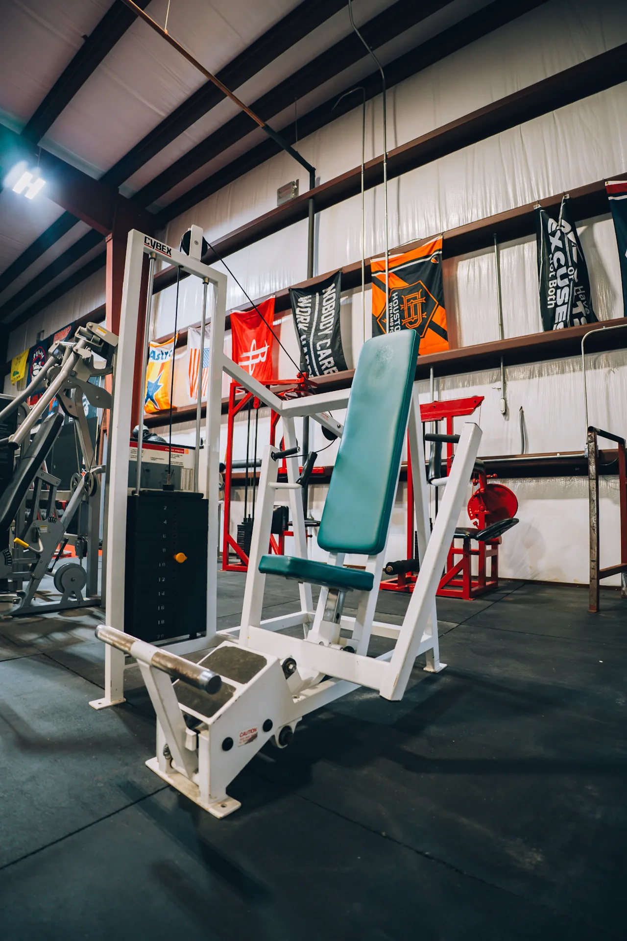 Strength machines on the Redline Barbell training floor